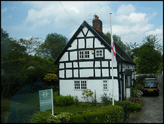 cottage with flagpole