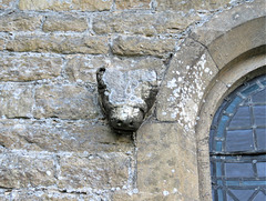 brize norton church, oxon this headstop on a north window looks like a c12 bear, perhaps a reuse during the victorian restoration(14)
