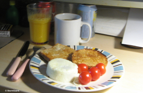 A Monday breakfast of steam poached eggs fresh tomatoes & freshly brewed Colombian Coffee M13 01