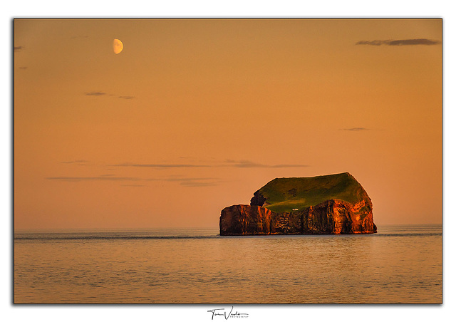 Suðurey in sunset and the moon