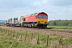 DB Cargo UK class 66 66137 with 3Z12 09.25 Knottingley T.M.D. - Knottingley T.M.D. via Scarborough,Bridlington, Hull Scarborough ,York Weedkiller train at Willerby Carr Crossing 3rd May 2020.