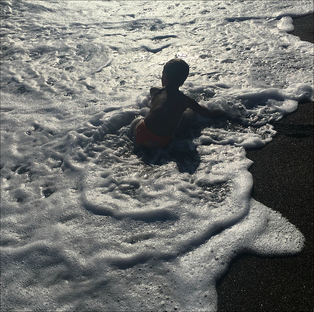 Playing in the foam.