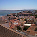 Towering view over Lisbon, Tagus River and Almada.