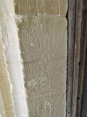 alvescote church, oxon (2) graffiti including a long arm and hand in the south doorway