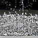 Bokeh of water in the fountain of Oropa, Biella (Italy)
