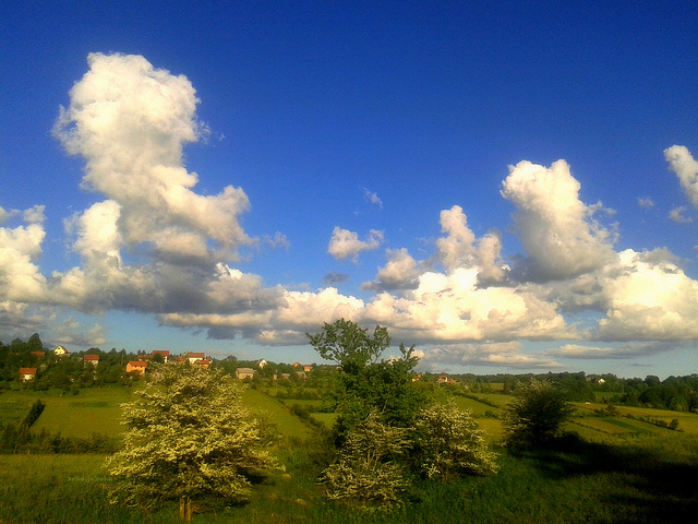 Landscape with spring clouds