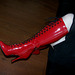 Mistress Tanya in red high-heeled boots / Maîtresse Tanya en bottes rouges à talons hauts