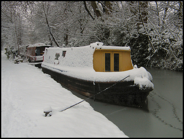 snow-wrapped houseboat
