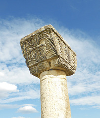 A decorated column capital