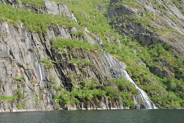 Norway, Lofoten Islands, Northern Bank of the Trollfjord with Waterfall