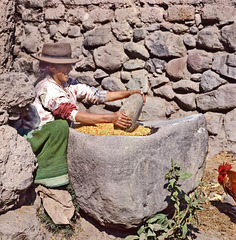 A smile while grinding corn- Ayacucho, Perú