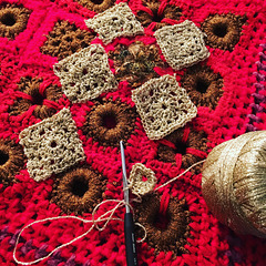Crochet WIP, red and gold
