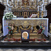 Main altar with jolly saints and an icon of St Peter