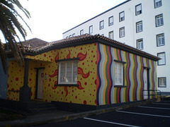 Painting on a house of social assistance.