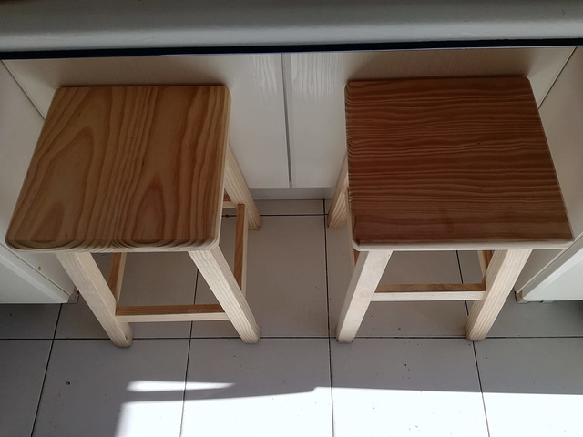 The desire of a sunny day seating on a kitchen bench