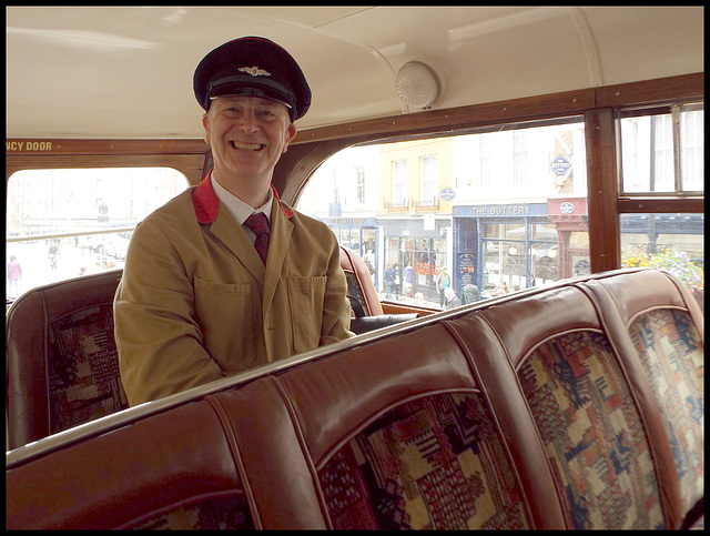 smiling bus conductor