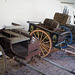 Horse-drawn trap and load wagons.