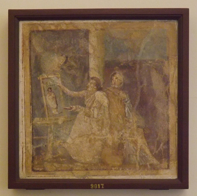 Wall Painting with a Female Painter Painting Dionysos from the House of the Surgeon in Pompeii in the Naples Archaeological Museum, July 2012