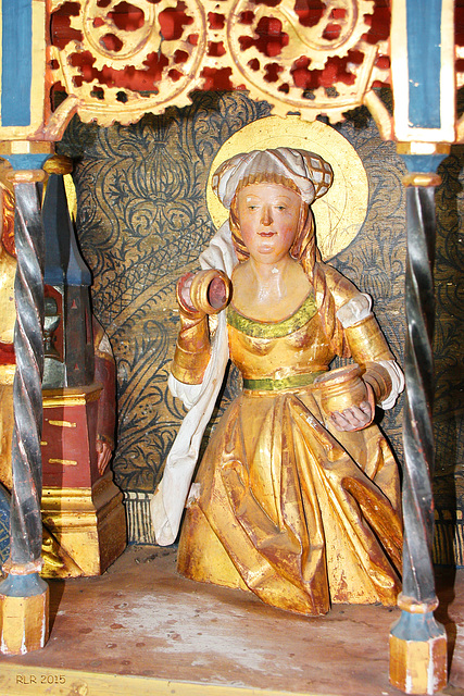 Kraak, Altar der Johanniterkirche, Heilige Frau mit Dose