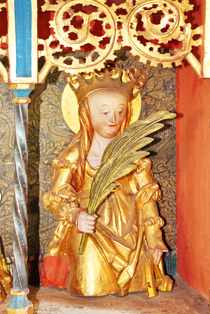 Kraak, Altar der Johanniterkirche, Heilige Frau mit Palmenzweig und Rad
