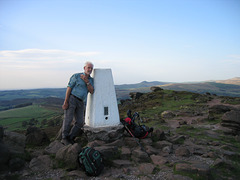 Trig Point on The Roaches (505m) with Shutlingsloe in the distance