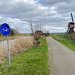 Ofwegen with an old traffic sign and the Lagenwaardse molen