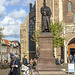 Delft nieuwkerk detail and Hugo Grotius statue