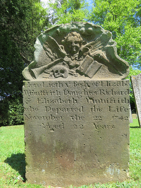 penshurst church, kent (16)c18 gravestone of elizabeth winnifrith +1742; skull, cherub, book, trumpet