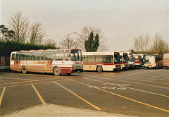 Buses and coaches parked at Ram Meadow, Bury St. Edmunds – 16 February 1994 (214-21)