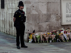 Policeman and flowers