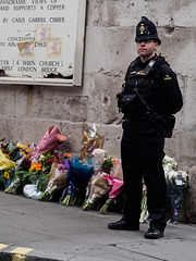 Policeman and flowers