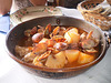 Clams with pork and potatoes in cataplana.