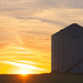 a grain bin at sunset 2