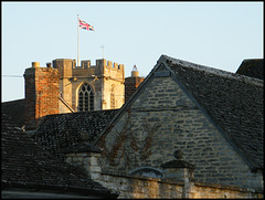 church flag above the rooftops