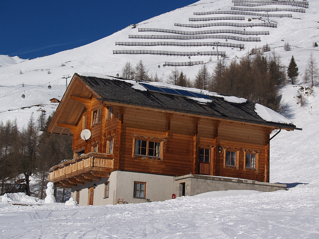 Ordinary Alpine Wooden House