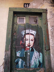 Btoy's poster on old door.
