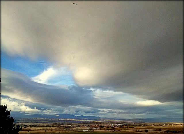 For Rene: A bit more sky! And a plane with its shadow projected onto the underside of the cloud from below!