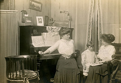 Posing at the Piano in the Parlor, ca. 1910