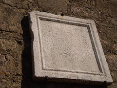 Inscription on side wall of Roman temple.