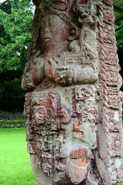 Honduras, Sculptural Image of Mayan King and Mayan Pictograms in Copan Ruinas