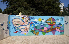 Wall painting at the entrance of Alto do Lumiar Basic School.