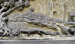 st mary's church, lambeth, london;   crocodile and shells from his collection on the 1853 copy of john tradescent +1662 tomb