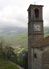 The bell tower of the church of Riabella, and overlooking the village of Rialmosso, other side of Cervo Valley