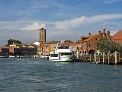 Venetian glimpses - Murano, one glimpse of the village with colorful houses. The landing on the Island