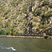 Train along and upstream Douro River.