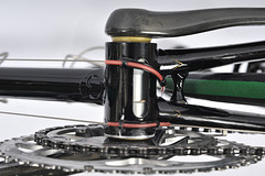 Bottom bracket shell features a long cut-out, under shell gear cable routing, and a heart carved into the bottom of the lug.