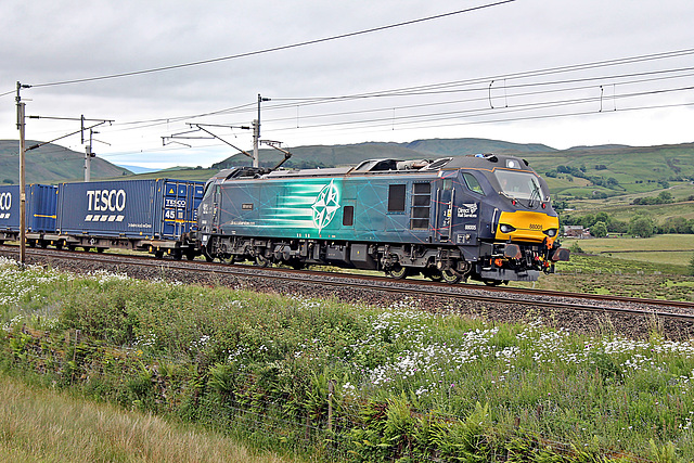 DRS  88005 MINERVA climbing Shap at Scout Green with 4S43 06.40 Daventry - Mossend  26th June 2021.
