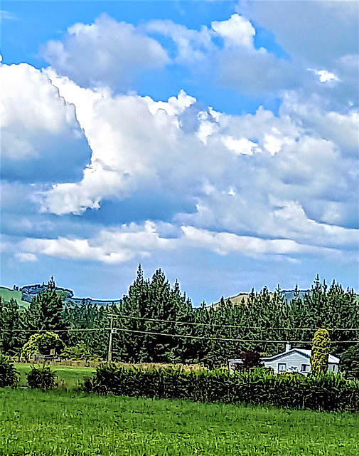 Farm Under Clouds.