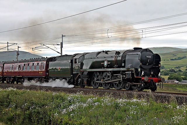 Bulleid Merchant Navy class 35018 BRITISH INDIA LINE climbing Shap at Scout Green with 1Z86 07.10 Euston - Carlisle The Cumbrian Mountain Express 26th June 2021. (steam from Carnforth)