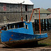 Beached Blue Boat (low tide, on the smokehouse ramp)